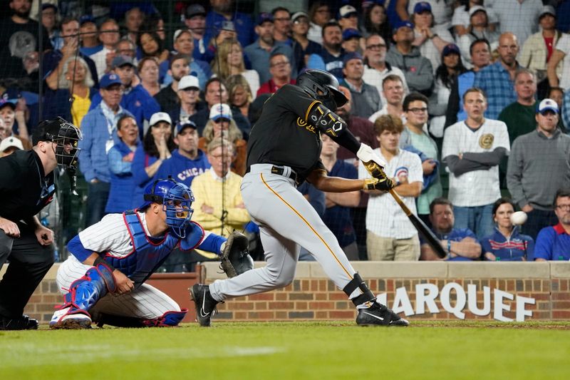 Sep 21, 2023; Chicago, Illinois, USA; Pittsburgh Pirates pinch-hitter Joshua Palacios (54) hits a three-run home run against the Chicago Cubs during the ninth inning at Wrigley Field. Mandatory Credit: David Banks-USA TODAY Sports
