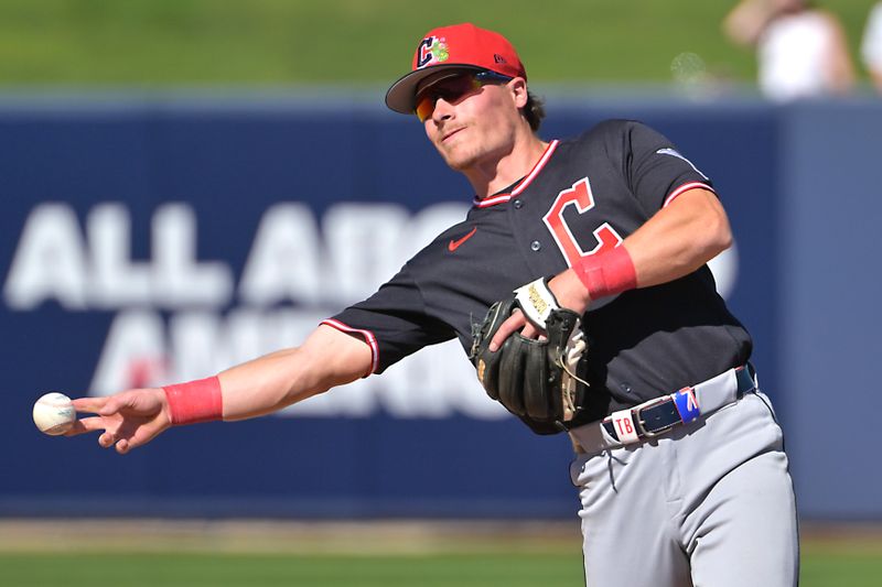 Feb 21, 2026; Phoenix, Arizona, USA;  Cleveland Guardians second baseman Travis Bazzana (72) makes a play  in the fourth inning against the Milwaukee Brewers at American Family Fields of Phoenix. Mandatory Credit: Jayne Kamin-Oncea-Imagn Images