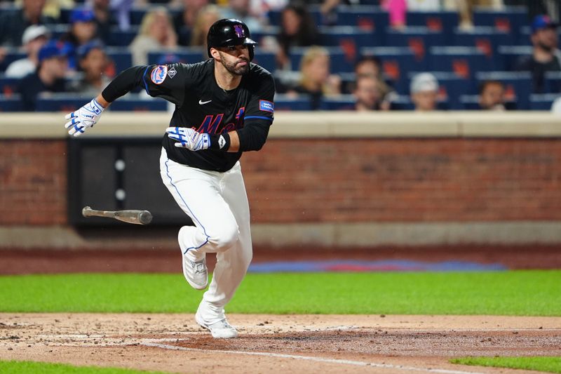 Jun 14, 2024; New York City, New York, USA; New York Mets designated hitter JD Martinez (28) runs out an RBI double against the San Diego Padres during the third inning at Citi Field. Mandatory Credit: Gregory Fisher-USA TODAY Sports