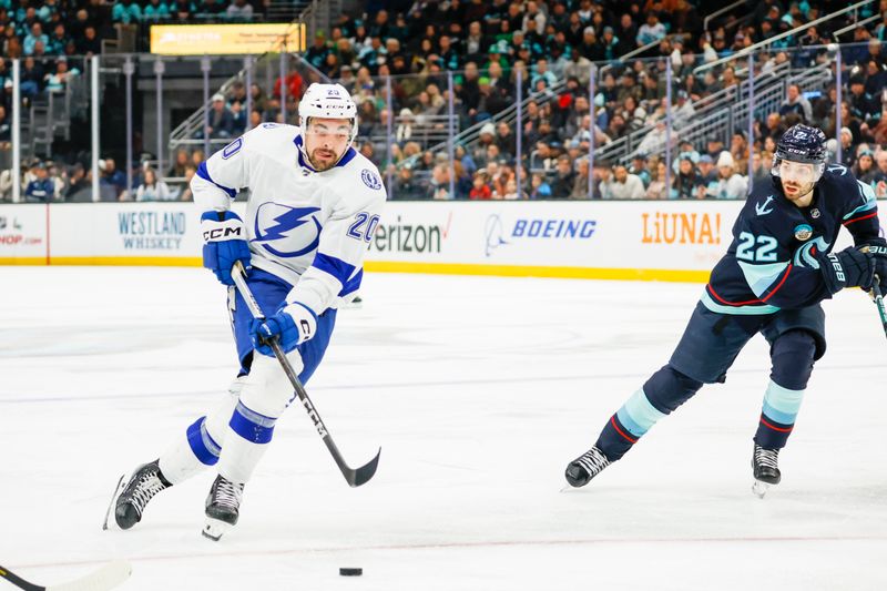 Dec 9, 2023; Seattle, Washington, USA; Tampa Bay Lightning left wing Nicholas Paul (20) skates with the puck against the Seattle Kraken during the third period at Climate Pledge Arena. Mandatory Credit: Joe Nicholson-USA TODAY Sports