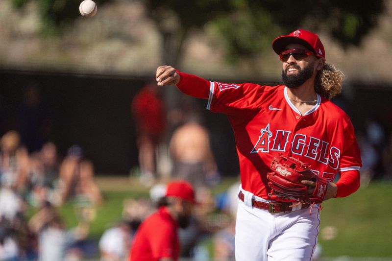 Mar 8, 2024; Tempe, Arizona, USA; Los Angeles Angels infielder Jack Lopez (55) throws back to first in the seventh during a spring training game against the Colorado Rockies at Tempe Diablo Stadium. Mandatory Credit: Allan Henry-USA TODAY Sports