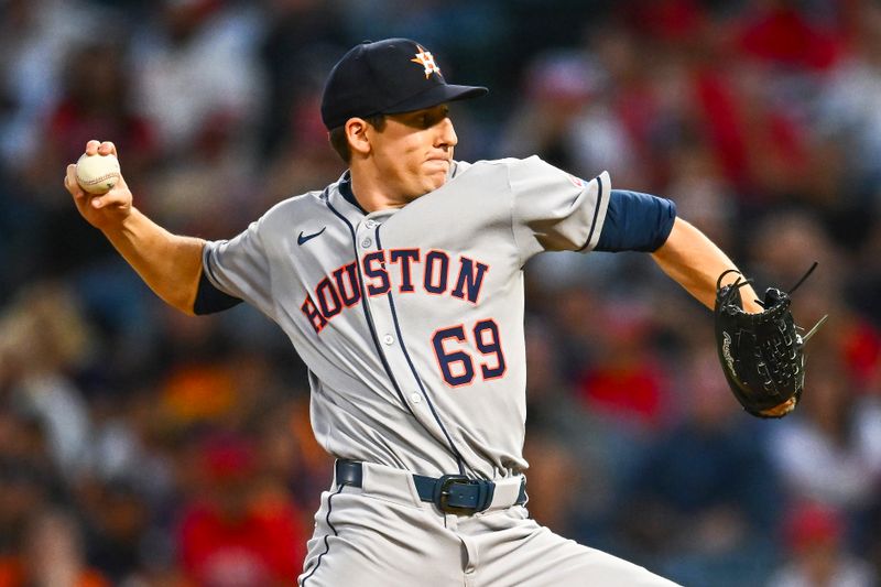 Sep 27, 2025; Anaheim, California, USA; Houston Astros starting pitcher AJ Blubaugh (69) throws a pitch against the Los Angeles Angels during the first inning at Angel Stadium. Mandatory Credit: Jonathan Hui-Imagn Images