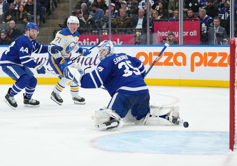 Mar 6, 2024; Toronto, Ontario, CAN; Buffalo Sabres left wing Victor Olofsson (71)scores a goal on Toronto Maple Leafs goaltender Ilya Samsonov (35) during the second period at Scotiabank Arena. Mandatory Credit: Nick Turchiaro-USA TODAY Sports