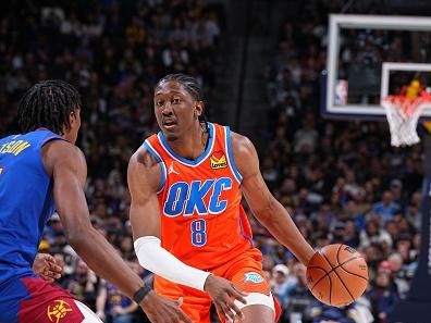 DENVER, CO - DECEMBER 16: Jalen Williams #8 of the Oklahoma City Thunder dribbles the ball during the game against the Denver Nuggets on December 16, 2023 at the Ball Arena in Denver, Colorado. NOTE TO USER: User expressly acknowledges and agrees that, by downloading and/or using this Photograph, user is consenting to the terms and conditions of the Getty Images License Agreement. Mandatory Copyright Notice: Copyright 2023 NBAE (Photo by Garrett Ellwood/NBAE via Getty Images)