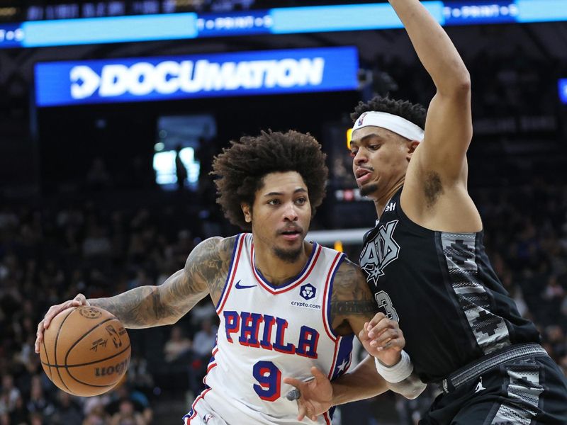 SAN ANTONIO, TX - APRIL 7: Kelly Oubre Jr. #9 of the Philadelphia 76ers dribbles the ball during the game against the San Antonio Spurs on April 7, 2024 at the Frost Bank Center in San Antonio, Texas. NOTE TO USER: User expressly acknowledges and agrees that, by downloading and or using this photograph, user is consenting to the terms and conditions of the Getty Images License Agreement. Mandatory Copyright Notice: Copyright 2024 NBAE (Photos by Tim Heitman/NBAE via Getty Images)