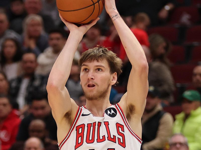 CHICAGO, ILLINOIS - DECEMBER 08: Matas Buzelis #14 of the Chicago Bulls shoots a three pointer against the Philadelphia 76ers during the second half at the United Center on December 08, 2024 in Chicago, Illinois. NOTE TO USER: User expressly acknowledges and agrees that, by downloading and or using this photograph, User is consenting to the terms and conditions of the Getty Images License Agreement.  (Photo by Michael Reaves/Getty Images)