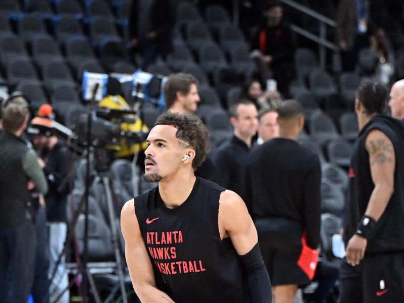 ATLANTA, GEORGIA - JANUARY 30: Trae Young #11 of the Atlanta Hawks warms up before the game against the Los Angeles Lakers on January 30, 2024 at State Farm Arena in Atlanta, Georgia. NOTE TO USER: User expressly acknowledges and agrees that, by downloading and or using this photograph, User is consenting to the terms and conditions of the Getty Images License Agreement. (Photo by Paras Griffin/Getty Images)