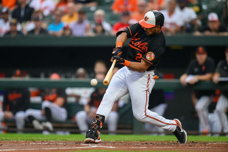 Jun 28, 2023; Baltimore, Maryland, USA; Baltimore Orioles right fielder Anthony Santander (25) hits a pitch during the first inning against the Cincinnati Reds at Oriole Park at Camden Yards. Mandatory Credit: Reggie Hildred-USA TODAY Sports