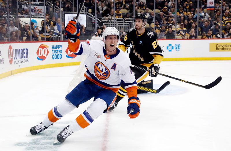 Mar 9, 2023; Pittsburgh, Pennsylvania, USA; New York Islanders center Brock Nelson (29) reacts after scoring the game winning goal n overtime against the Pittsburgh Penguins at PPG Paints Arena. The Islanders won 4-3 in overtime. Mandatory Credit: Charles LeClaire-USA TODAY Sports