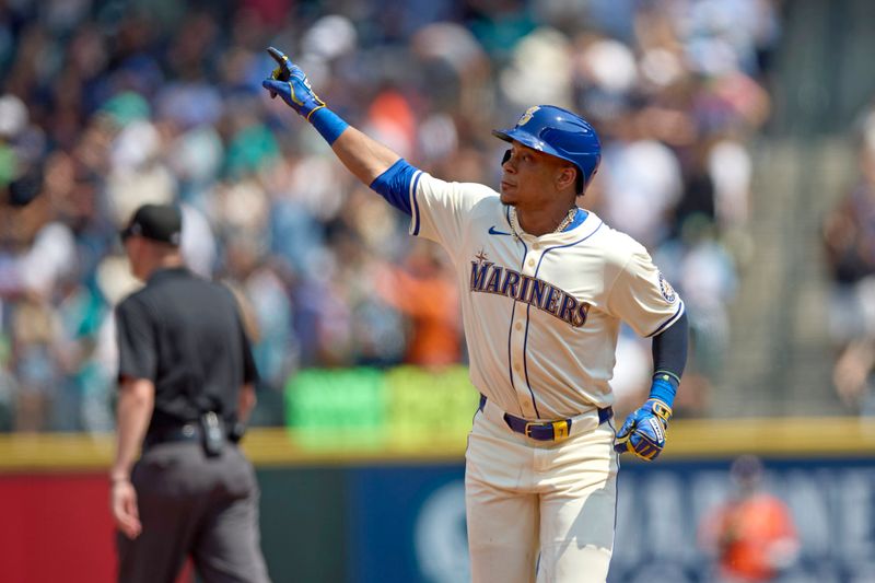 Jul 21, 2024; Seattle, Washington, USA; Seattle Mariners second baseman Jorge Polanco (7) rounds the bases after his solo home run against the Houston Astros during the fourth inning at T-Mobile Park. Mandatory Credit: John Froschauer-USA TODAY Sports