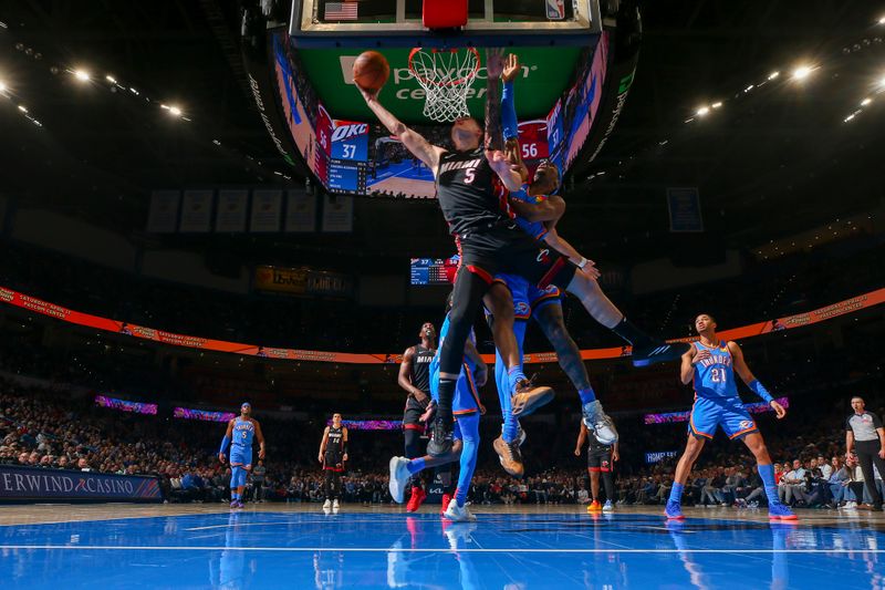 OKLAHOMA CITY, OK - FEBRUARY 12: Nikola Jovic #5 of the Miami Heat drives to the basket during the game against the Oklahoma City Thunder on February 12, 2025 at Paycom Center in Oklahoma City, Oklahoma. NOTE TO USER: User expressly acknowledges and agrees that, by downloading and or using this photograph, User is consenting to the terms and conditions of the Getty Images License Agreement. Mandatory Copyright Notice: Copyright 2024 NBAE (Photo by Zach Beeker/NBAE via Getty Images)