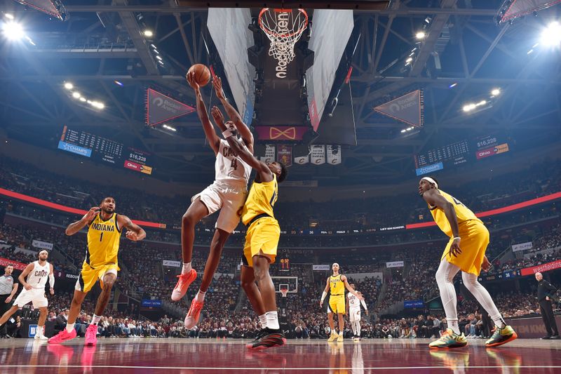 CLEVELAND, OH - MAY 4: Evan Mobley #4 of the Cleveland Cavaliers drives to the basket during the game against the Indiana Pacers during Round 2 Game 1 of the 2025 NBA Playoffs on May 4, 2025 at Rocket Arena in Cleveland, Ohio. NOTE TO USER: User expressly acknowledges and agrees that, by downloading and/or using this Photograph, user is consenting to the terms and conditions of the Getty Images License Agreement. Mandatory Copyright Notice: Copyright 2025 NBAE (Photo by David Liam Kyle/NBAE via Getty Images)