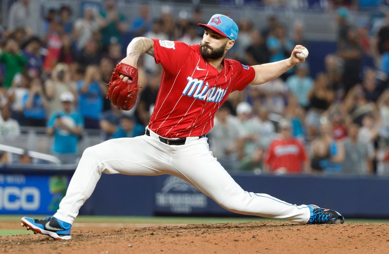 Jul 6, 2024; Miami, Florida, USA; Miami Marlins relief pitcher Tanner Scott (66) pitches against the Chicago White Sox during the ninth inning at loanDepot Park. Mandatory Credit: Rhona Wise-USA TODAY Sports