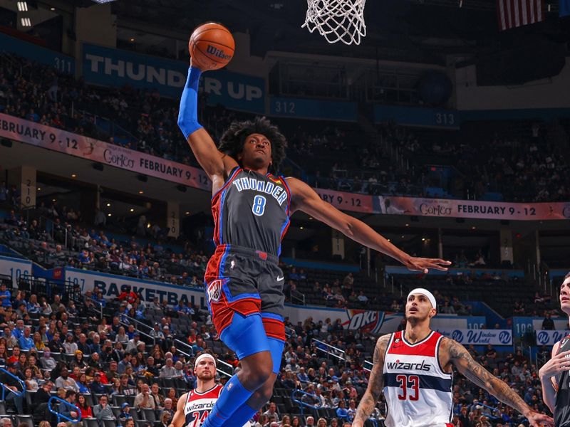 OKLAHOMA CITY, OK - JANUARY 6:  Jalen Williams #8 of the Oklahoma City Thunder drives to the basket during the game against the Washington Wizards on January 6, 2023 at Paycom Arena in Oklahoma City, Oklahoma. NOTE TO USER: User expressly acknowledges and agrees that, by downloading and or using this photograph, User is consenting to the terms and conditions of the Getty Images License Agreement. Mandatory Copyright Notice: Copyright 2023 NBAE (Photo by Zach Beeker/NBAE via Getty Images)