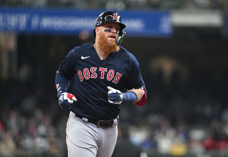 Apr 23, 2023; Milwaukee, Wisconsin, USA; Boston Red Sox first baseman Justin Turner (2) rounds the bases after hitting a home run against the Milwaukee Brewers at American Family Field. Mandatory Credit: Michael McLoone-USA TODAY Sports