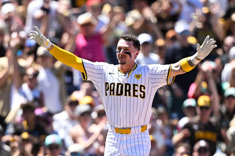 August 14, 2024; San Diego, California, USA; San Diego Padres outfielder Jackson Merrill (3) reacts after hitting an RBI triple against the Pittsburgh Pirates during the third inning at Petco Park. Mandatory Credit: Denis Poroy-USA TODAY Sports at Petco Park. 