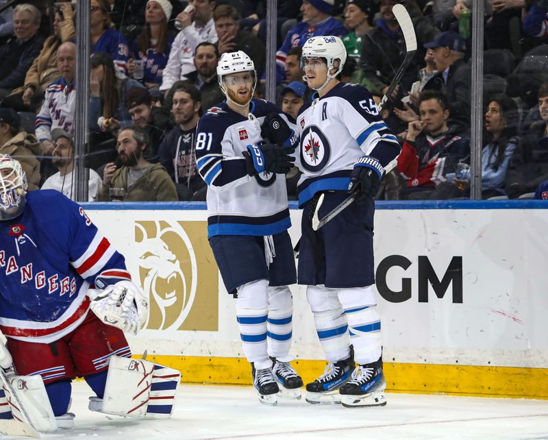 Mar 19, 2024; New York, New York, USA; Winnipeg Jets center Mark Scheifele (55) celebrates his goal against the New York Rangers with left wing Kyle Connor (81) during the second period at Madison Square Garden. Mandatory Credit: Danny Wild-USA TODAY Sports