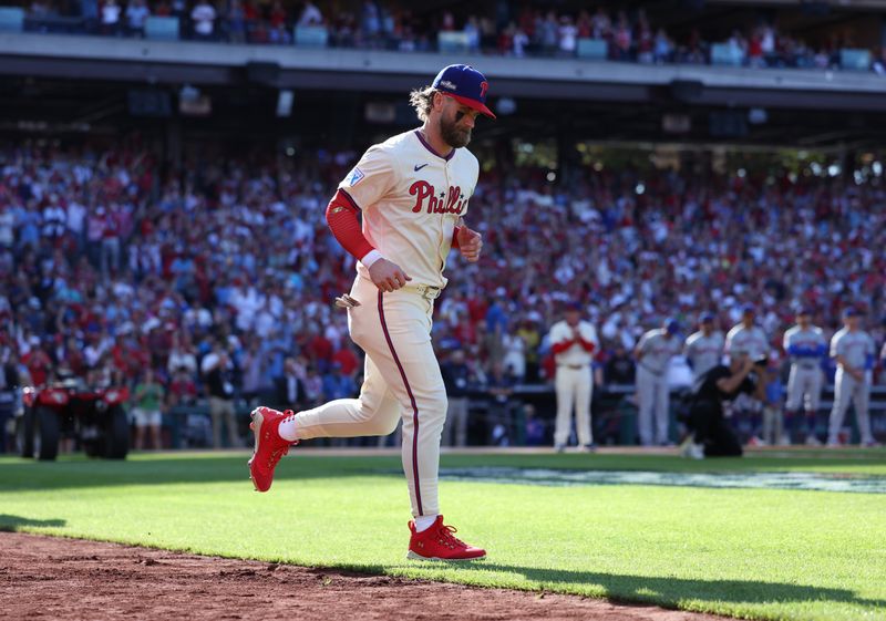 Oct 5, 2024; Philadelphia, PA, USA; Philadelphia Phillies first baseman Bryce Harper (3) is introduced before playing against the New York Mets in game one of the NLDS for the 2024 MLB Playoffs at Citizens Bank Park. Mandatory Credit: Bill Streicher-Imagn Images