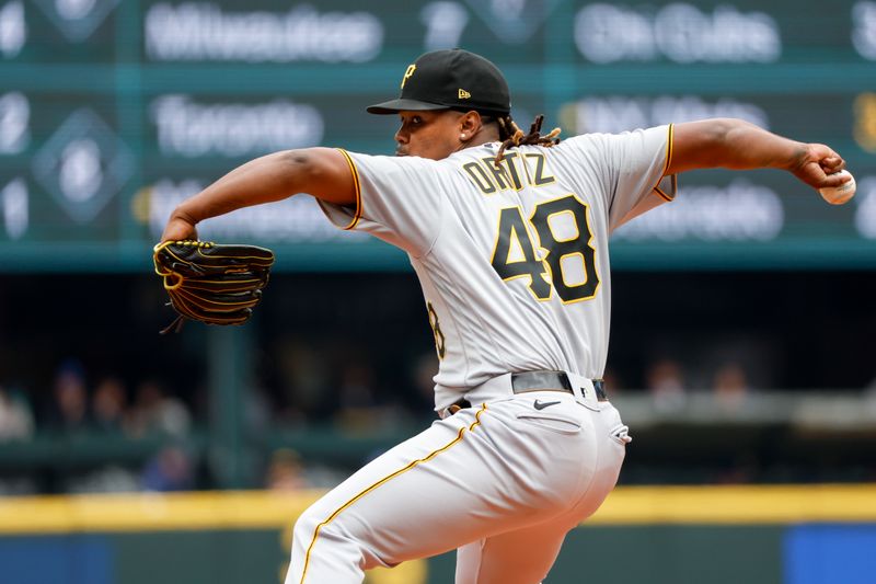 May 28, 2023; Seattle, Washington, USA; Pittsburgh Pirates starting pitcher Luis Ortiz (48) throws against the Seattle Mariners during the first inning at T-Mobile Park. Mandatory Credit: Joe Nicholson-USA TODAY Sports