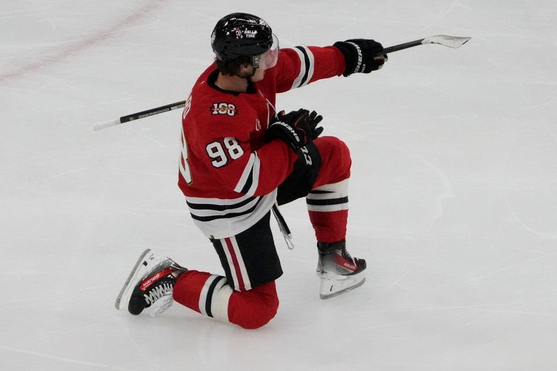 Oct 28, 2025; Chicago, Illinois, USA; Chicago Blackhawks center Connor Bedard (98) celebrates his hat trick against the Ottawa Senators during the third period at United Center. Mandatory Credit: David Banks-Imagn Images