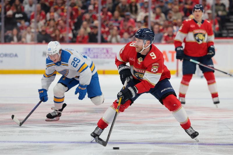Dec 20, 2025; Sunrise, Florida, USA; Florida Panthers center Sam Bennett (9) moves the puck against the St. Louis Blues during the second period at Amerant Bank Arena. Mandatory Credit: Sam Navarro-Imagn Images