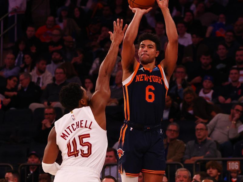 NEW YORK, NEW YORK - NOVEMBER 01: Quentin Grimes #6 of the New York Knicks takes a shot against Donovan Mitchell #45 of the Cleveland Cavaliers at Madison Square Garden on November 01, 2023 in New York City. NOTE TO USER: User expressly acknowledges and agrees that, by downloading and or using this photograph, User is consenting to the terms and conditions of the Getty Images License Agreement. Mandatory Copyright Notice: Copyright 2023 NBAE (Photo by Mike Stobe/Getty Images)