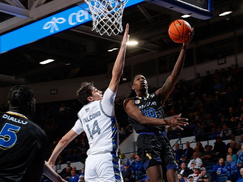 Mar 4, 2023; Colorado Springs, Colorado, USA; San Jose State Spartans guard Omari Moore (10) drives to the net against Air Force Falcons forward Beau Becker (14) in the first half at Clune Arena. Mandatory Credit: Isaiah J. Downing-USA TODAY Sports