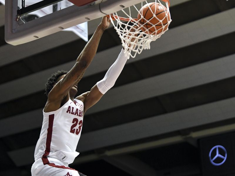 Feb 18, 2023; Tuscaloosa, Alabama, USA;  Alabama forward Nick Pringle (23) dunks against Georgia at Coleman Coliseum. Mandatory Credit: Gary Cosby Jr.-USA TODAY Sports