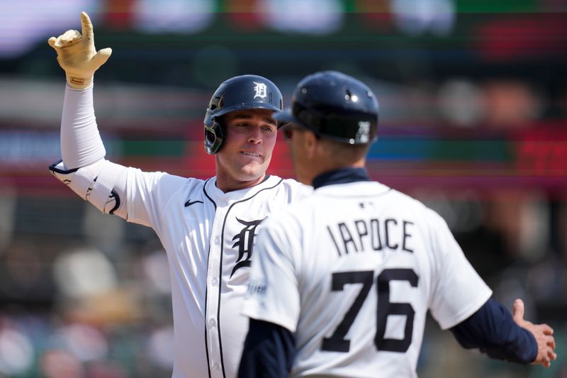 Apr 20, 2025; Detroit, Michigan, USA; Detroit Tigers outfielder Kerry Carpenter (30) celebrates hitting an RBI single against the Kansas City Royals in the fifth inning at Comerica Park. Mandatory Credit: Aaron Doster-Imagn Images