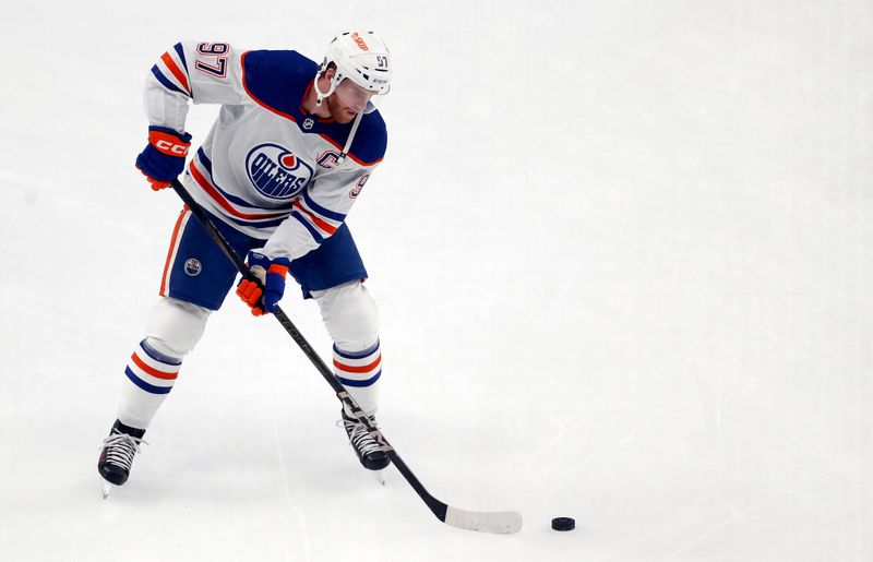 Mar 10, 2024; Pittsburgh, Pennsylvania, USA;  Edmonton Oilers center Connor McDavid (97) warms up against the Pittsburgh Penguins at PPG Paints Arena. Mandatory Credit: Charles LeClaire-USA TODAY Sports