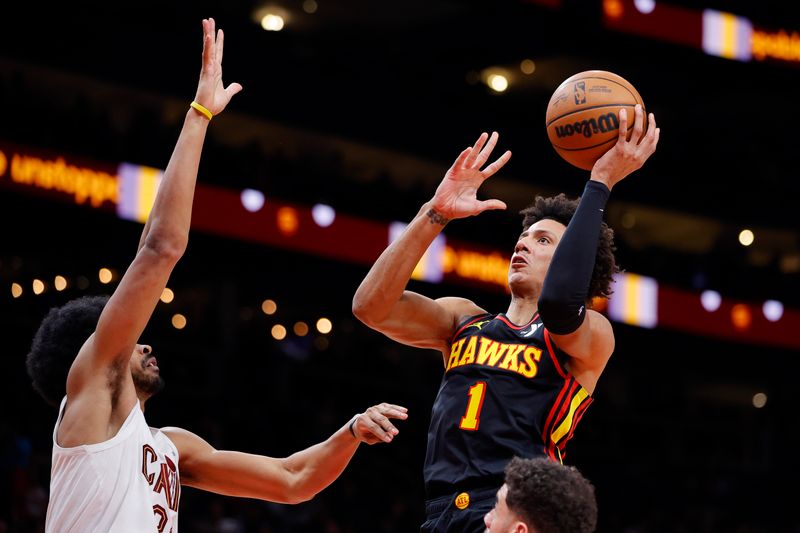 ATLANTA, GEORGIA - JANUARY 20: Jalen Johnson #1 of the Atlanta Hawks goes up against Jarrett Allen #31 of the Cleveland Cavaliers during the second half at State Farm Arena on January 20, 2024 in Atlanta, Georgia. NOTE TO USER: User expressly acknowledges and agrees that, by downloading and or using this photograph, User is consenting to the terms and conditions of the Getty Images License Agreement. (Photo by Alex Slitz/Getty Images)