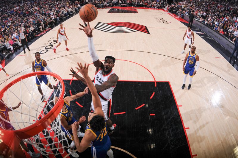 PORTLAND, OR - APRIL 11:  Deandre Ayton #2 of the Portland Trail Blazers goes to the basket during the game on April 11, 2024 at the Moda Center Arena in Portland, Oregon. NOTE TO USER: User expressly acknowledges and agrees that, by downloading and or using this photograph, user is consenting to the terms and conditions of the Getty Images License Agreement. Mandatory Copyright Notice: Copyright 2024 NBAE (Photo by Cameron Browne/NBAE via Getty Images)