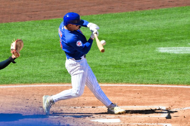 Feb 27, 2026; Mesa, Arizona, USA; Chicago Cubs third baseman Matt Shaw (6) singles in the second inning against the Cleveland Guardians at Sloan Park. Mandatory Credit: Matt Kartozian-Imagn Images