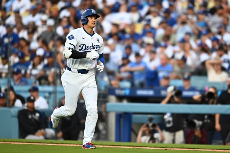 Jun 1, 2025; Los Angeles, California, USA; Los Angeles Dodgers designated hitter Shohei Ohtani (17) reacts after being forced out at first base against the New York Yankees during the eighth inning at Dodger Stadium. Mandatory Credit: Jonathan Hui-Imagn Images