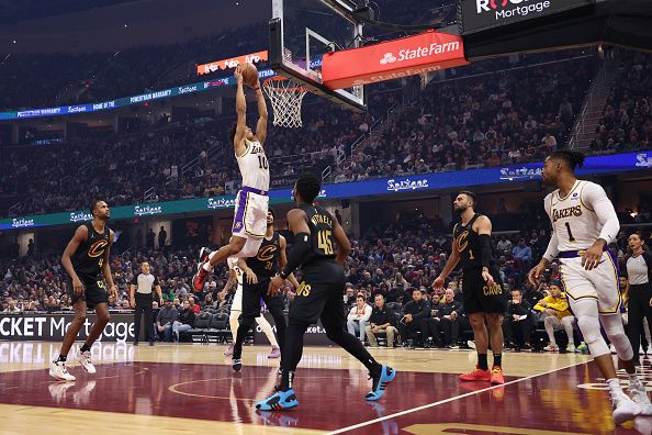 CLEVELAND, OH - NOVEMBER 25: Max Christie #10 of the Los Angeles Lakers drives to the basket during the game against the Cleveland Cavaliers on November 25, 2023 at Rocket Mortgage FieldHouse in Cleveland, Ohio. NOTE TO USER: User expressly acknowledges and agrees that, by downloading and/or using this Photograph, user is consenting to the terms and conditions of the Getty Images License Agreement. Mandatory Copyright Notice: Copyright 2023 NBAE (Photo by  Lauren Leigh Bacho/NBAE via Getty Images)