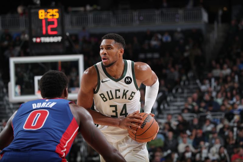 MILWAUKEE, WI - NOVEMBER 13: Giannis Antetokounmpo #34 of the Milwaukee Bucks looks to pass the ball during the game against the Detroit Pistons on November 13, 2024 at the Fiserv Forum Center in Milwaukee, Wisconsin. NOTE TO USER: User expressly acknowledges and agrees that, by downloading and or using this Photograph, user is consenting to the terms and conditions of the Getty Images License Agreement. Mandatory Copyright Notice: Copyright 2024 NBAE (Photo by Gary Dineen/NBAE via Getty Images).