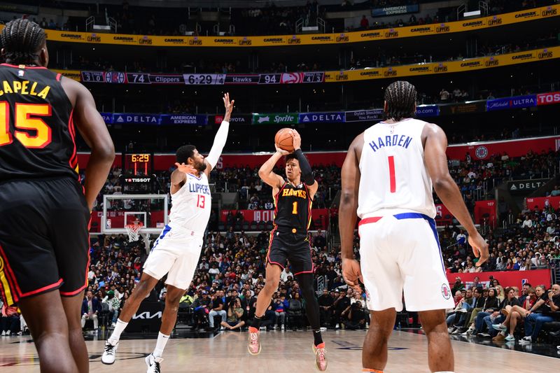 LOS ANGELES, CA - MARCH 17: Jalen Johnson #1 of the Atlanta Hawks shoots a three point basket against the LA Clippers on March 17, 2024 at Crypto.Com Arena in Los Angeles, California. NOTE TO USER: User expressly acknowledges and agrees that, by downloading and/or using this Photograph, user is consenting to the terms and conditions of the Getty Images License Agreement. Mandatory Copyright Notice: Copyright 2024 NBAE (Photo by Adam Pantozzi/NBAE via Getty Images)