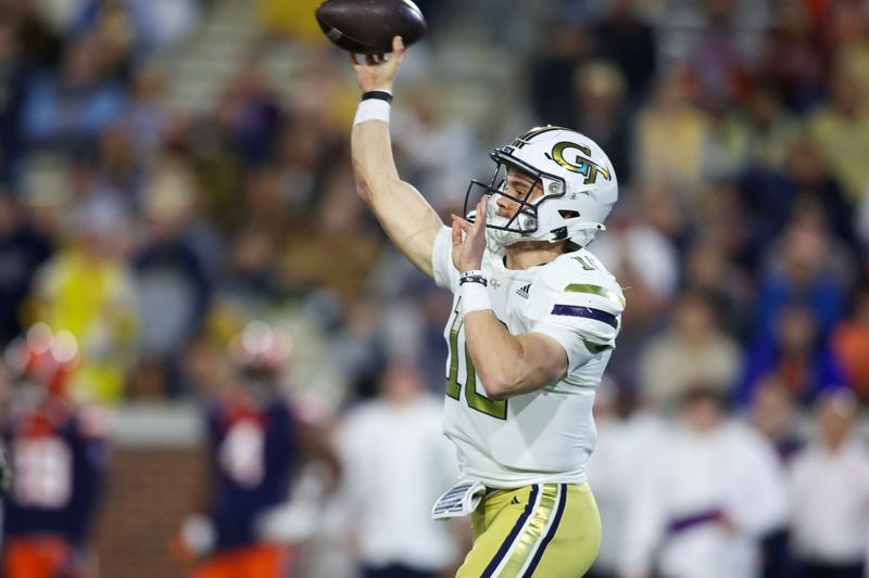 Nov 18, 2023; Atlanta, Georgia, USA; Georgia Tech Yellow Jackets quarterback Haynes King (10) throws a pass against the Syracuse Orange in the first half at Bobby Dodd Stadium at Hyundai Field. Mandatory Credit: Brett Davis-USA TODAY Sports