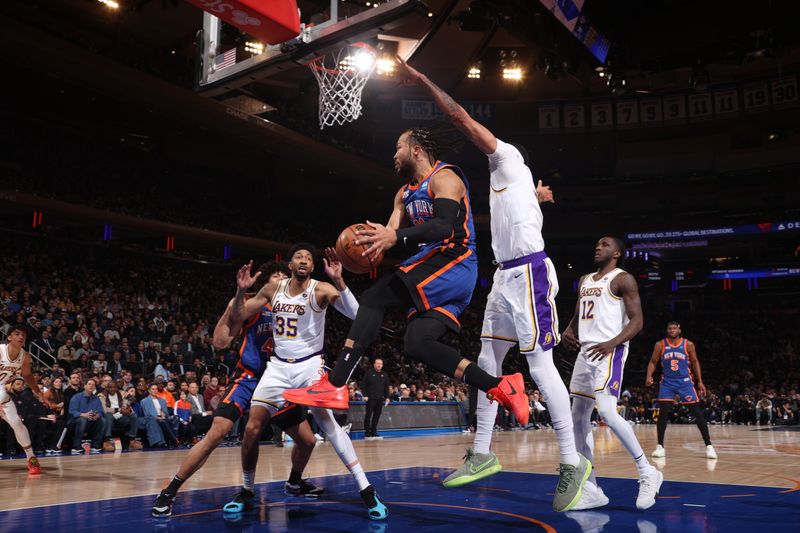 NEW YORK, NY - FEBRUARY 3: Jalen Brunson #11 of the New York Knicks drives to the basket during the game against the Los Angeles Lakers on February 3, 2024 at Madison Square Garden in New York City, New York.  NOTE TO USER: User expressly acknowledges and agrees that, by downloading and or using this photograph, User is consenting to the terms and conditions of the Getty Images License Agreement. Mandatory Copyright Notice: Copyright 2024 NBAE  (Photo by Nathaniel S. Butler/NBAE via Getty Images)