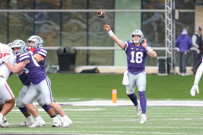 Oct 28, 2023; Manhattan, Kansas, USA; Kansas State Wildcats quarterback Will Howard (18) passes the ball during the second quarter at Bill Snyder Family Football Stadium. Mandatory Credit: Scott Sewell-USA TODAY Sports