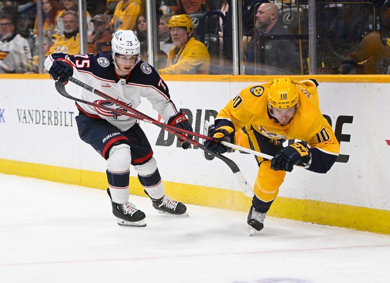 Jan 17, 2023; Nashville, Tennessee, USA;  Columbus Blue Jackets defenseman Tim Berni (75) trips Nashville Predators center Colton Sissons (10) during the third period at Bridgestone Arena. Mandatory Credit: Steve Roberts-USA TODAY Sports