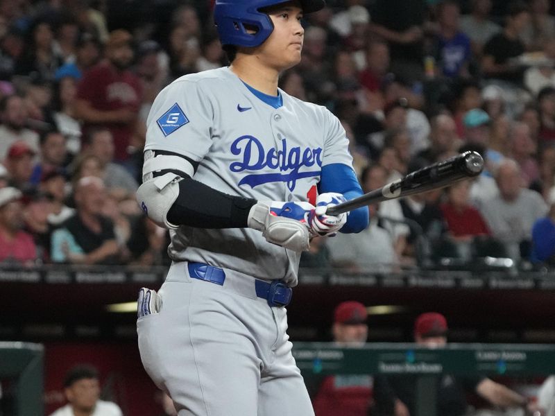 Sep 24, 2025; Phoenix, Arizona, USA; Los Angeles Dodgers two-way player Shohei Ohtani (17) hits against the Arizona Diamondbacks in the fourth inning at Chase Field. Mandatory Credit: Rick Scuteri-Imagn Images
