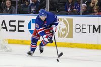 Rangers Outshine Devils in High-Octane Faceoff, Zac Jones Leads with Stellar Performance