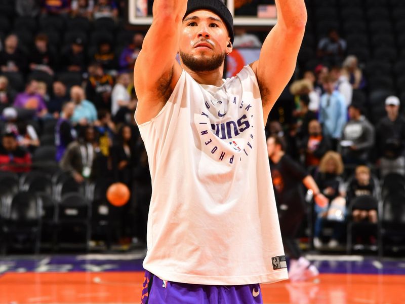 PHOENIX, AZ - JANUARY 11: Devin Booker #1 of the Phoenix Suns warms up before the game against the Utah Jazz on January 11, 2025 at Footprint Center in Phoenix, Arizona. NOTE TO USER: User expressly acknowledges and agrees that, by downloading and or using this photograph, user is consenting to the terms and conditions of the Getty Images License Agreement. Mandatory Copyright Notice: Copyright 2025 NBAE (Photo by Barry Gossage/NBAE via Getty Images)
