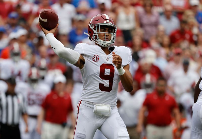 Sep 18, 2021; Gainesville, Florida, USA; Alabama Crimson Tide quarterback Bryce Young (9) throws the ball against the Florida Gators during the first quarter at Ben Hill Griffin Stadium. Mandatory Credit: Kim Klement-USA TODAY Sports