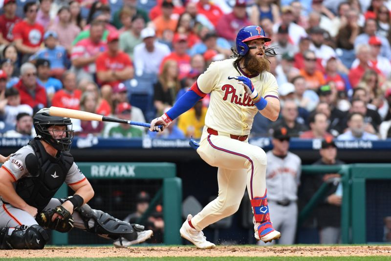 May 6, 2024; Philadelphia, Pennsylvania, USA; Philadelphia Phillies outfielder Brandon Marsh (16) hits a double against the San Francisco Giants during the fifth inning at Citizens Bank Park. Mandatory Credit: Eric Hartline-USA TODAY Sports