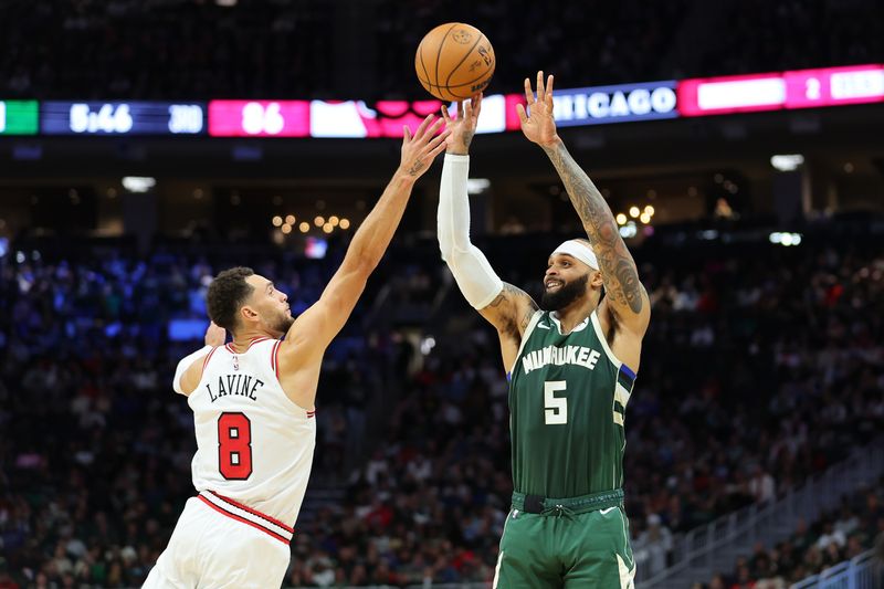 MILWAUKEE, WISCONSIN - OCTOBER 25: Gary Trent Jr. #5 of the Milwaukee Bucks shoots over Zach LaVine #8 of the Chicago Bulls during the second half of a game at Fiserv Forum on October 25, 2024 in Milwaukee, Wisconsin. NOTE TO USER: User expressly acknowledges and agrees that, by downloading and or using this photograph, User is consenting to the terms and conditions of the Getty Images License Agreement. (Photo by Stacy Revere/Getty Images)