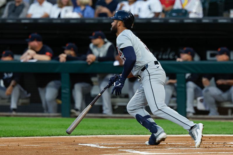 Aug 23, 2024; Chicago, Illinois, USA; Detroit Tigers outfielder Riley Greene (31) hits a double against the Chicago White Sox during the first inning at Guaranteed Rate Field. Mandatory Credit: Kamil Krzaczynski-USA TODAY Sports