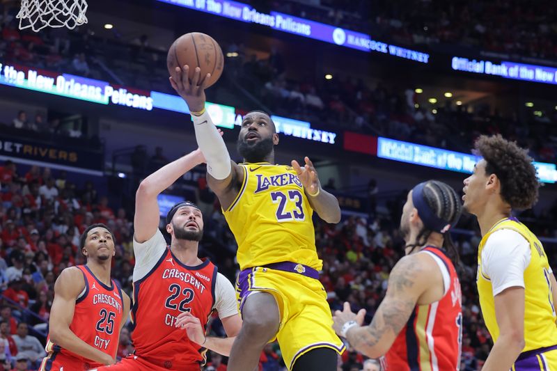 NEW ORLEANS, LOUISIANA - APRIL 16: LeBron James #23 of the Los Angeles Lakers shoots against Larry Nance Jr. #22 of the New Orleans Pelicans during the second half of a play-in tournament game at the Smoothie King Center on April 16, 2024 in New Orleans, Louisiana. NOTE TO USER: User expressly acknowledges and agrees that, by downloading and or using this Photograph, user is consenting to the terms and conditions of the Getty Images License Agreement. (Photo by Jonathan Bachman/Getty Images)