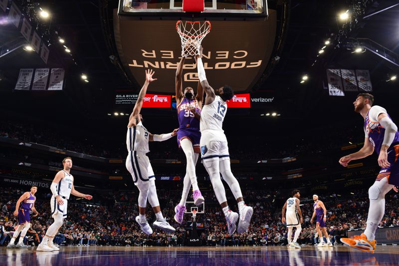 PHOENIX, AZ - JANUARY 7: Kevin Durant #35 of the Phoenix Suns shoots the ball during the game against the Memphis Grizzlies on January 7, 2024 at Footprint Center in Phoenix, Arizona. NOTE TO USER: User expressly acknowledges and agrees that, by downloading and or using this photograph, user is consenting to the terms and conditions of the Getty Images License Agreement. Mandatory Copyright Notice: Copyright 2024 NBAE (Photo by Barry Gossage/NBAE via Getty Images)